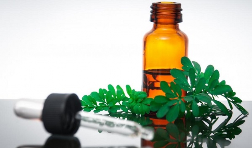 rue-with-medicine-bottle-and-dropper